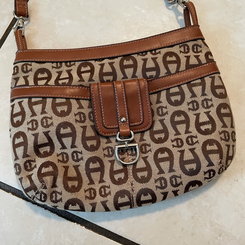 Sac bandoulière en cuir Etienne Aigner Noir en Cuir - 63221882